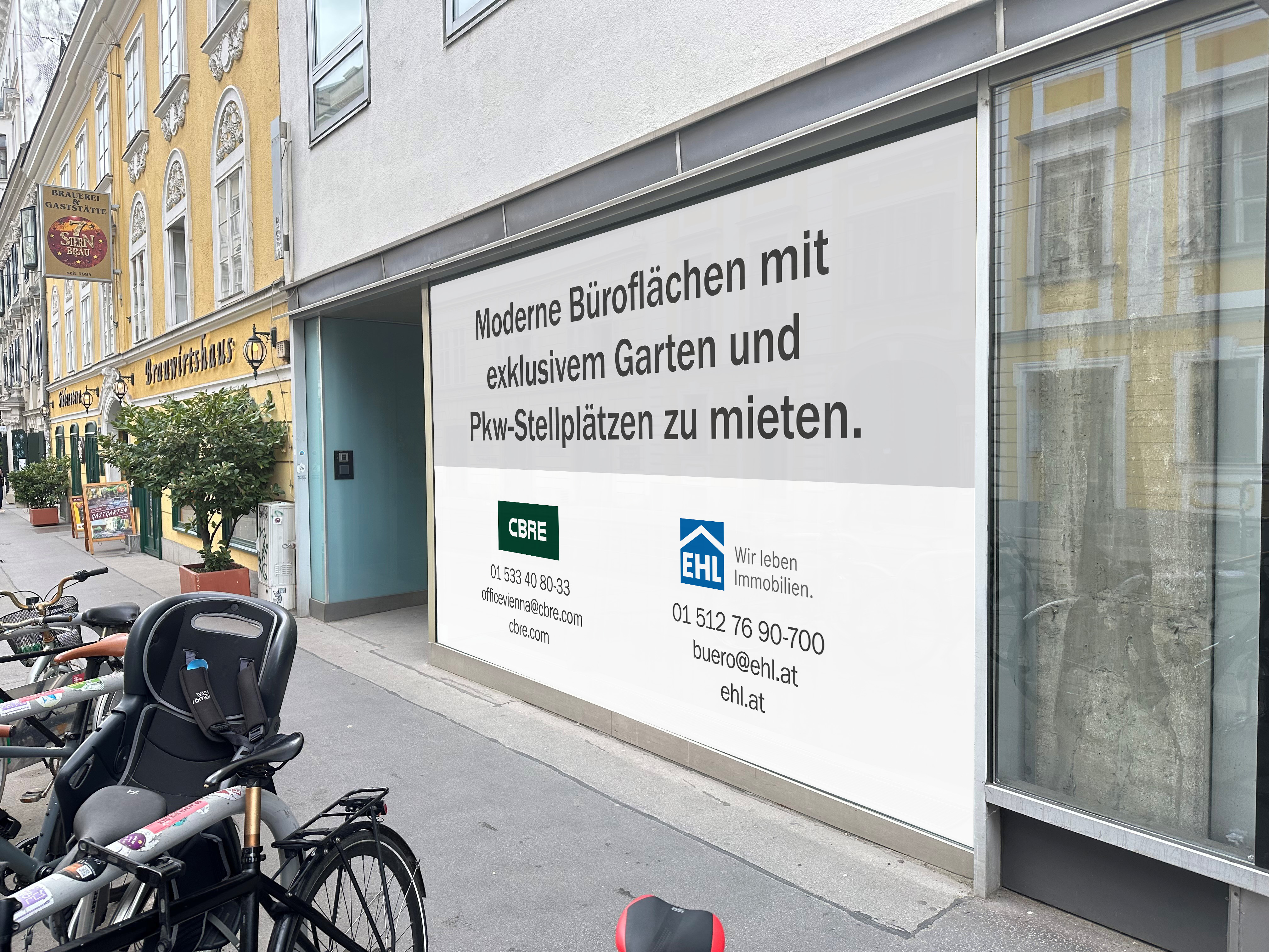 Großflächige Auslagenbeklebung für CBRE und EHL